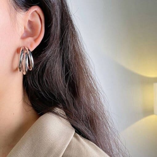 Needle Earrings With Multi-Layered Circular Rings Design - Image 2